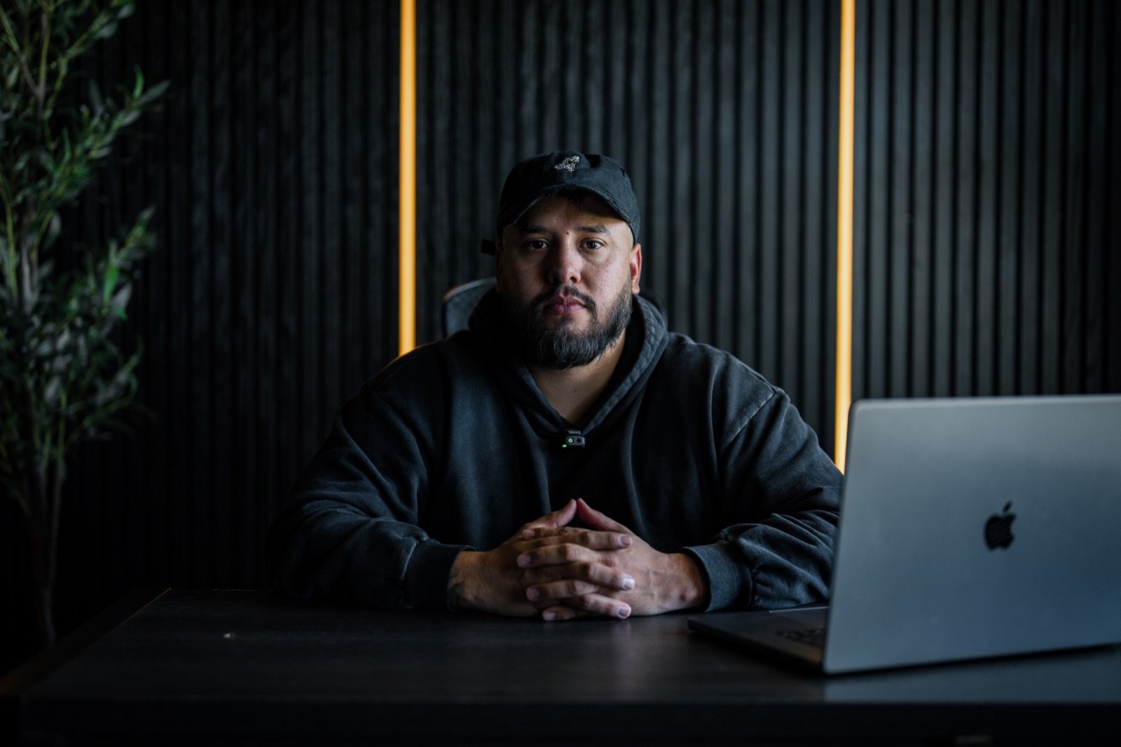 Kevin Romero at his desk in Riverside, California
